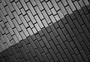 Diagonal black & white brick wall backdrop