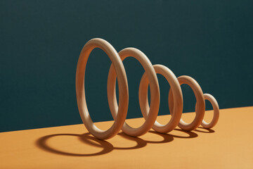 axis of wooden rings shapes.