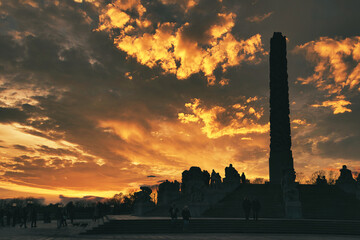 Monolitten. Norwegian park. Sunset with heavy strong colors. Vigelandsparken or Frognerparken it is called. In Oslo. 
