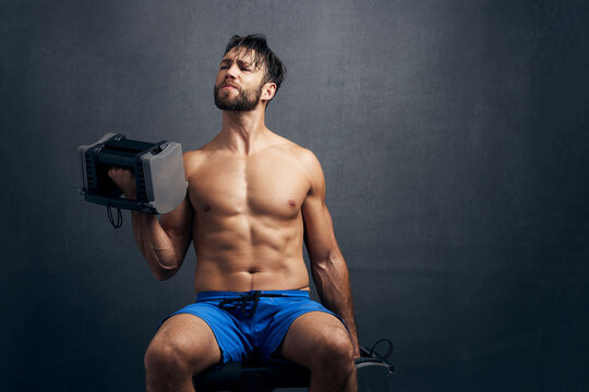 Strong Man Lifting Free Weights 