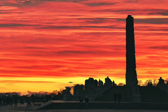 Monolitten. Norwegian park. Sunset with heavy strong colors. Vigelandsparken or Frognerparken it is called. In Oslo. 