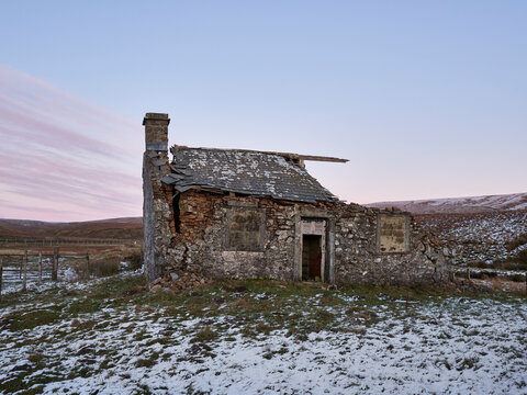 Old ruin at dusk. Ribblehead, North Yorkshire, UK.