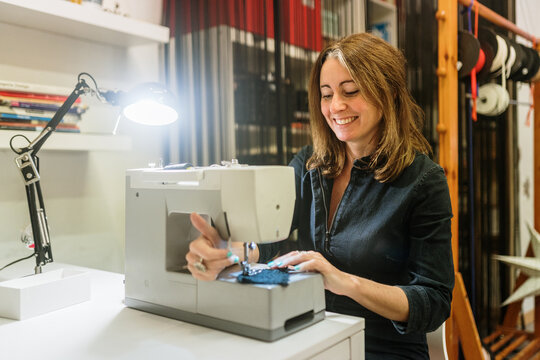 Woman using a sewing machine