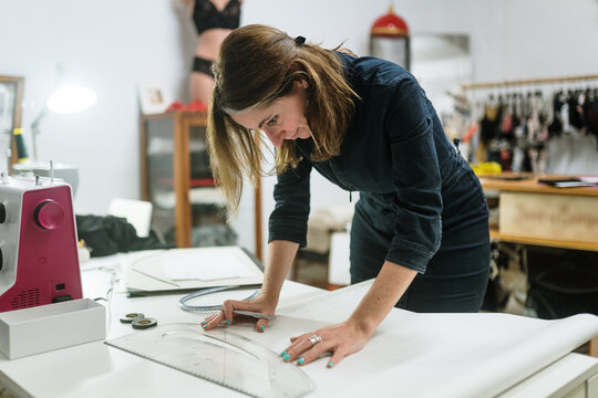 Seamstress working on a pattern