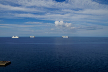 Costa cruiseships or cruise ship liners Pacifica, Fortuna and Favolosa anchored at sea offshore of...