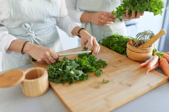two sisters cooking healthy food