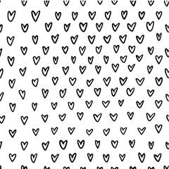Seamless pattern made of hand drawn doodle hearts. Black and white tiling background. Romantic backdrop texture for web site, blog, wallpaper, textile, wedding decor and invitation.