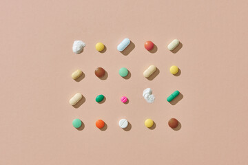 Creative layout of colorful pills and capsules