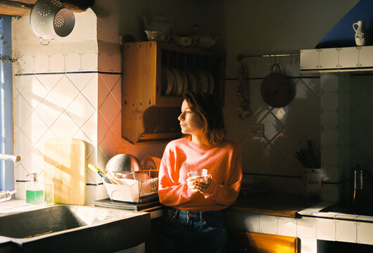 pensive in the kitchen
