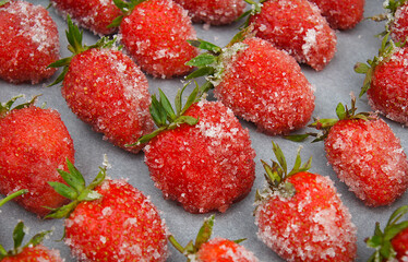 Appetizing fresh strawberries with sugar