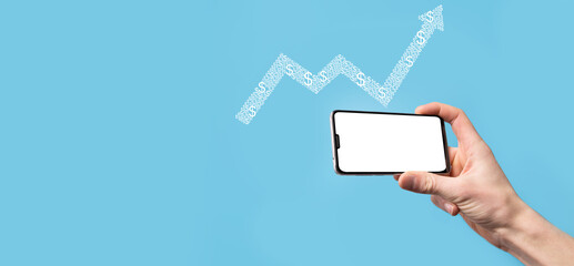 Hand hold drawing on screen growing graph, arrow of positive growth icon.pointing at creative business chart with upward arrows.Financial, business growth concept.