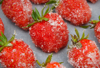 Appetizing fresh strawberries with sugar
