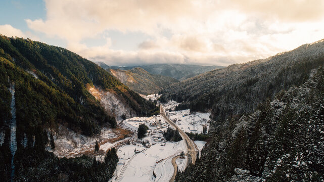The Aerial View Of Small Japanese Village After Snow Day