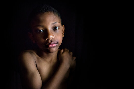 Striking portrait of young black boy 