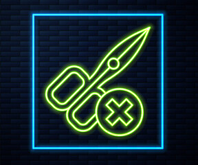 Glowing neon line No scissors icon isolated on brick wall background. Vector