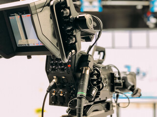Professional video camera in TV studio