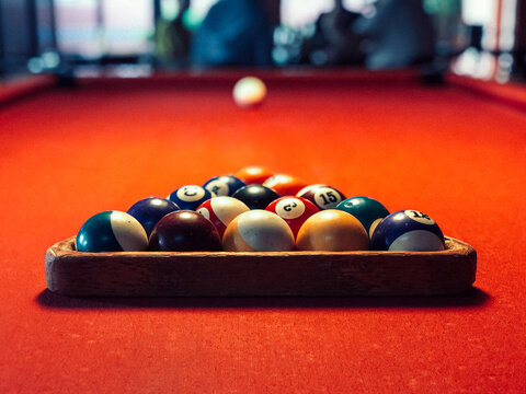 Billiards Rack With Balls On Red Billiards Table