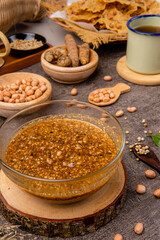 Rempeyek or peyek kacang is a deep-fried savoury Indonesian-Javanese cracker made from flour (usually rice flour) with peanut, lime leaves and other ingredients, bound or coated by crispy flour batter