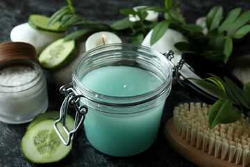 Skin care scrub concept on black smokey background