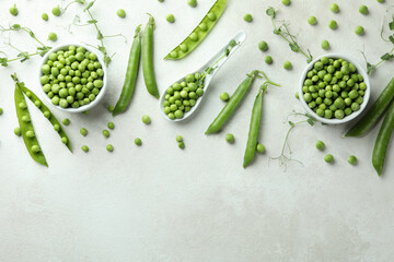 Fresh green pea on white textured background