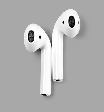 recommend clip art: White headphones wireless earphones on grey background