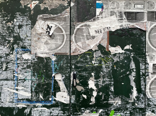 wall with torn posters