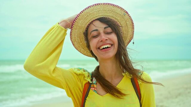 portrait of freedom satisfied woman enjoying sea beach getaway vacation, feeling good