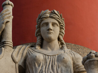 Fototapeta premium Stone sculpture Volga at the Bottom of the Rostral Column in Saint-Petersburg