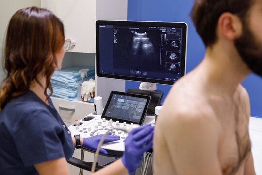 Medical specialist treating patient in hospital 