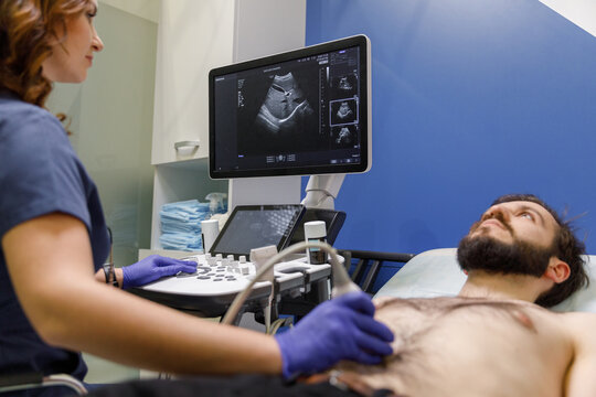 Male patient having diagnostic in clinic 