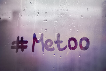 words with hashtag Metoo on window by written finger concept photo on purple rainy background