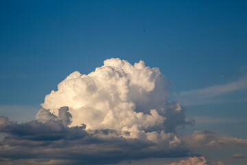white voluminous fluffy cumulus cloud