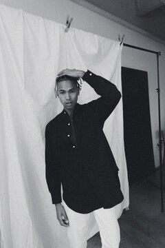 Man Unbuttoning Shirt 