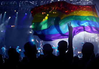 Fototapeta na wymiar Gay parade with LGBT flag.