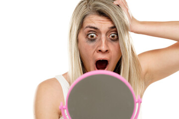 shocked woman with smudged makeup