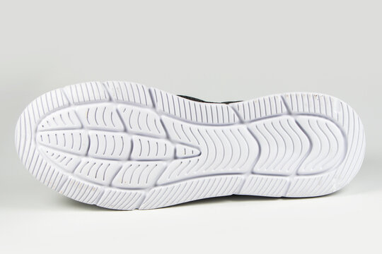 Sole of sport shoe on white background