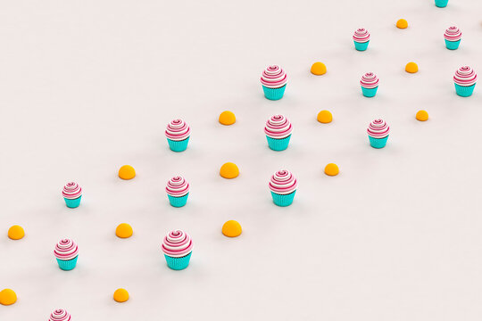 pink and white Cupcakes with orange balls