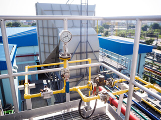 Pressure gauge of measuring instrument close up in industry zone at power plant.