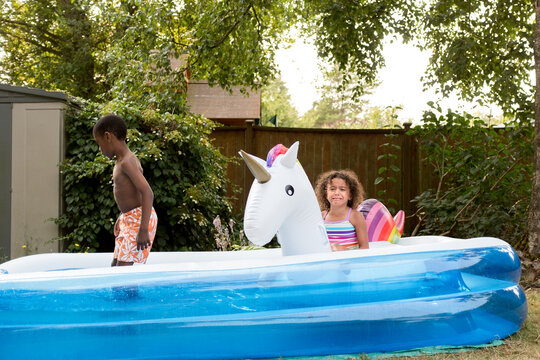 Crying Girl In Back Yard Pool