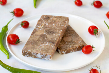 Turkish roasted meat ( kavurma ) on a white plate. Turkish cuisine. Local name dana kavurma