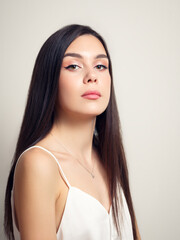 Fototapeta premium young woman brunette girl on a white background