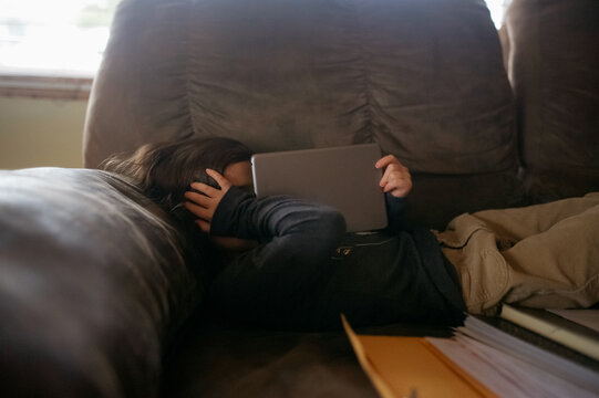 A sassy girl hiding her face. 