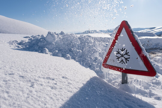 snow road sign with deep  snow everywhere
