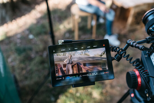 Actress viewed through a video camera's monitor