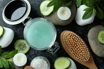 Skin care scrub concept on black smokey background