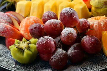 assorted fruits on a plate closeup