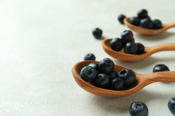 Fresh berry concept with blueberry on white textured table