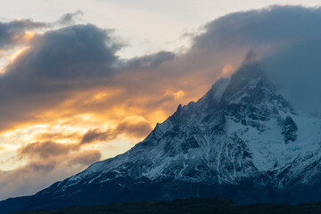 Naklejka na ściany i meble Sunrise and sunset scenery, majestic mountain peaks. Torres del Paine National Park, a popular travel destination in Chile. The stunning natural scenery of South America.