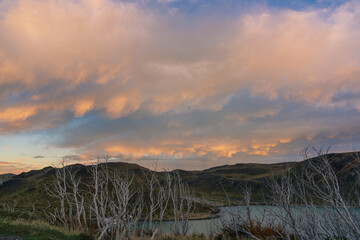 Sunrise and sunset scenery, majestic mountain peaks. Torres del Paine National Park, a popular travel destination in Chile. The stunning natural scenery of South America.