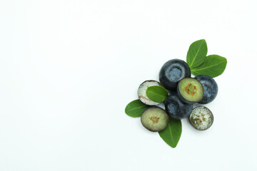 Fresh blueberry with leaves on white background